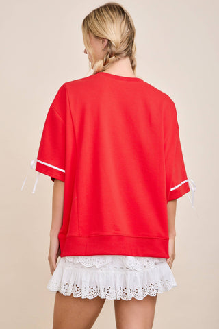Main Strip - TOUCHDOWN Eyelet Appliqué Pullover Top