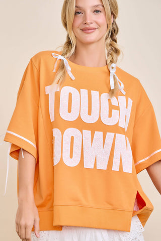 Main Strip - TOUCHDOWN Eyelet Appliqué Pullover Top