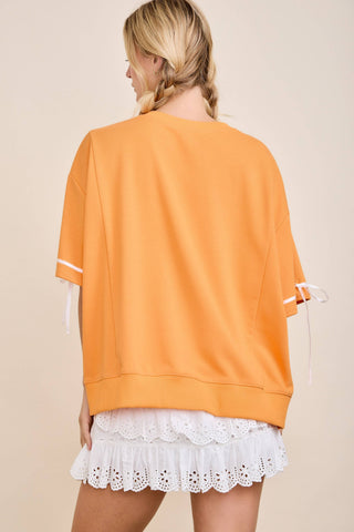 Main Strip - TOUCHDOWN Eyelet Appliqué Pullover Top
