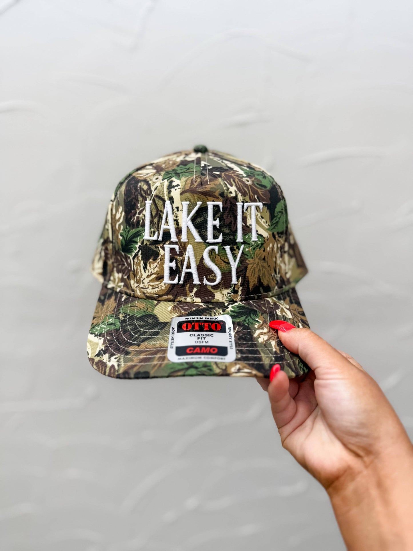 Lake It Easy Embroidered Camo Trucker Hat