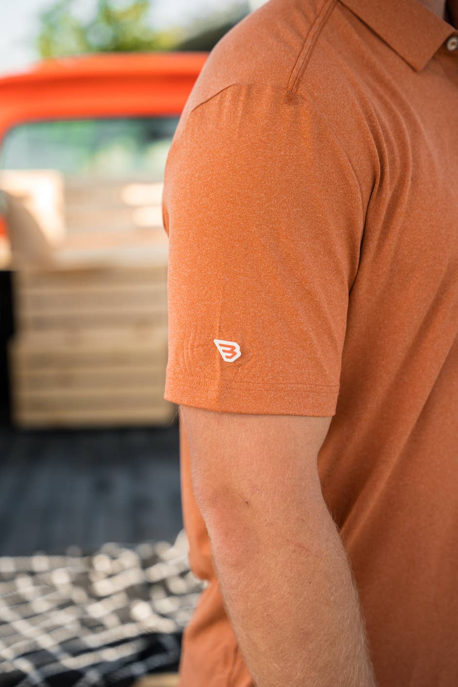 BURLEBO - Performance Polo - Heather Orange