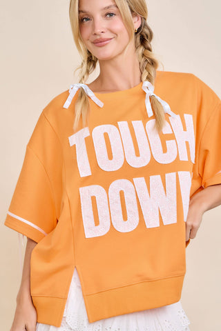 Main Strip - TOUCHDOWN Eyelet Appliqué Pullover Top