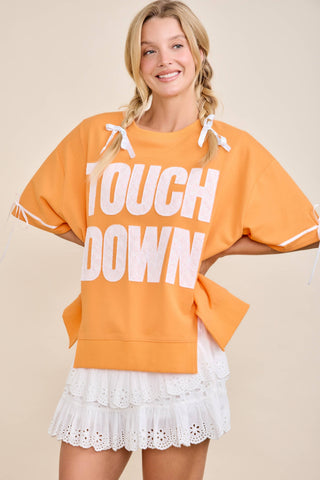 Main Strip - TOUCHDOWN Eyelet Appliqué Pullover Top